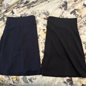 Two LOFT skirts one black and one navy size XL